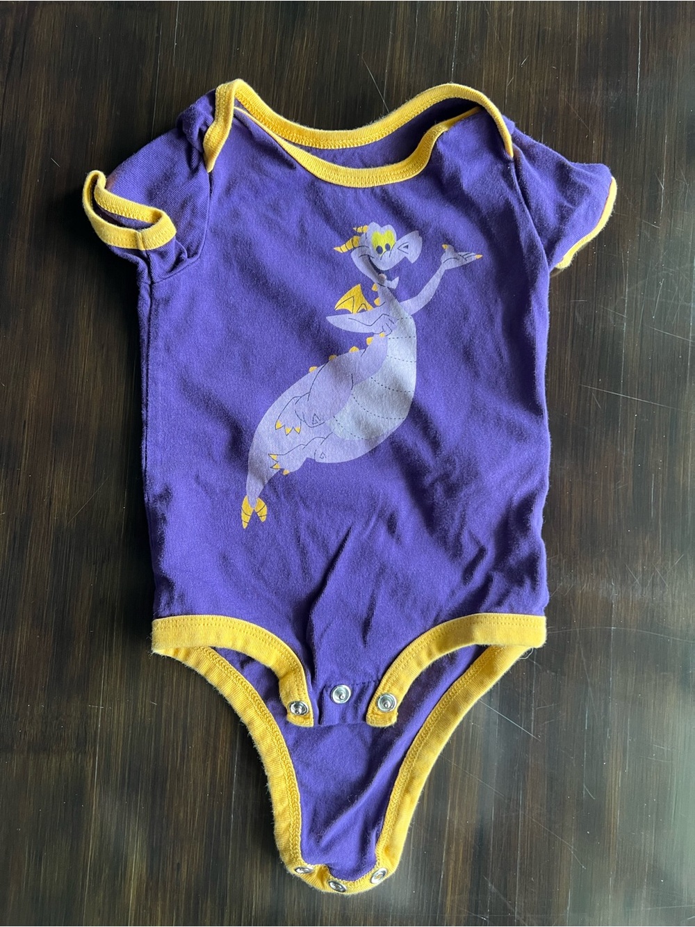 Disney figment baby onesie